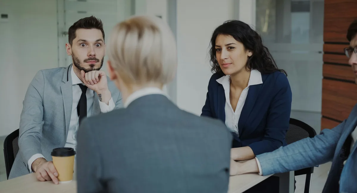 Loan advisor helping a client review financial documents