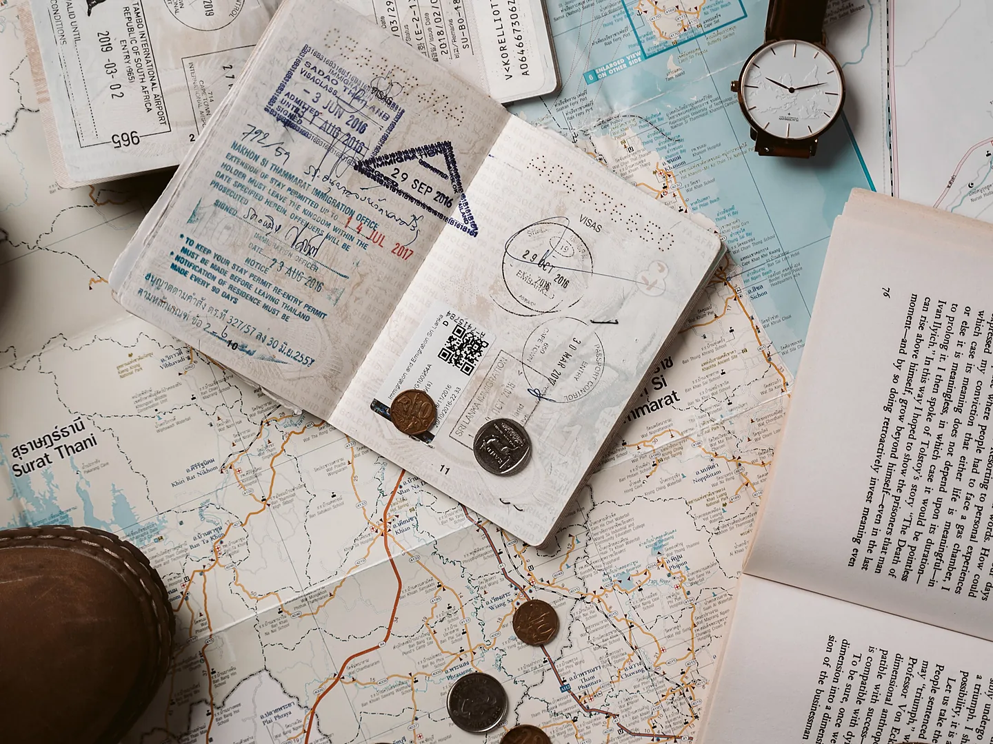 Passport and travel documents representing passport application assistance
